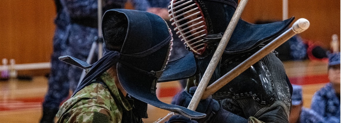 Japanese military personnel from the Japanese Maritime Self-Defense Force (JMSDF), the Japanese Ground Self-Defense Force (JGSDF), and Japanese Air Self-Defense Force (JASDF) demonstrate Jukendo in an exercise held onboard Naval Air Facility Atsugi during exercise Keen Sword 25.