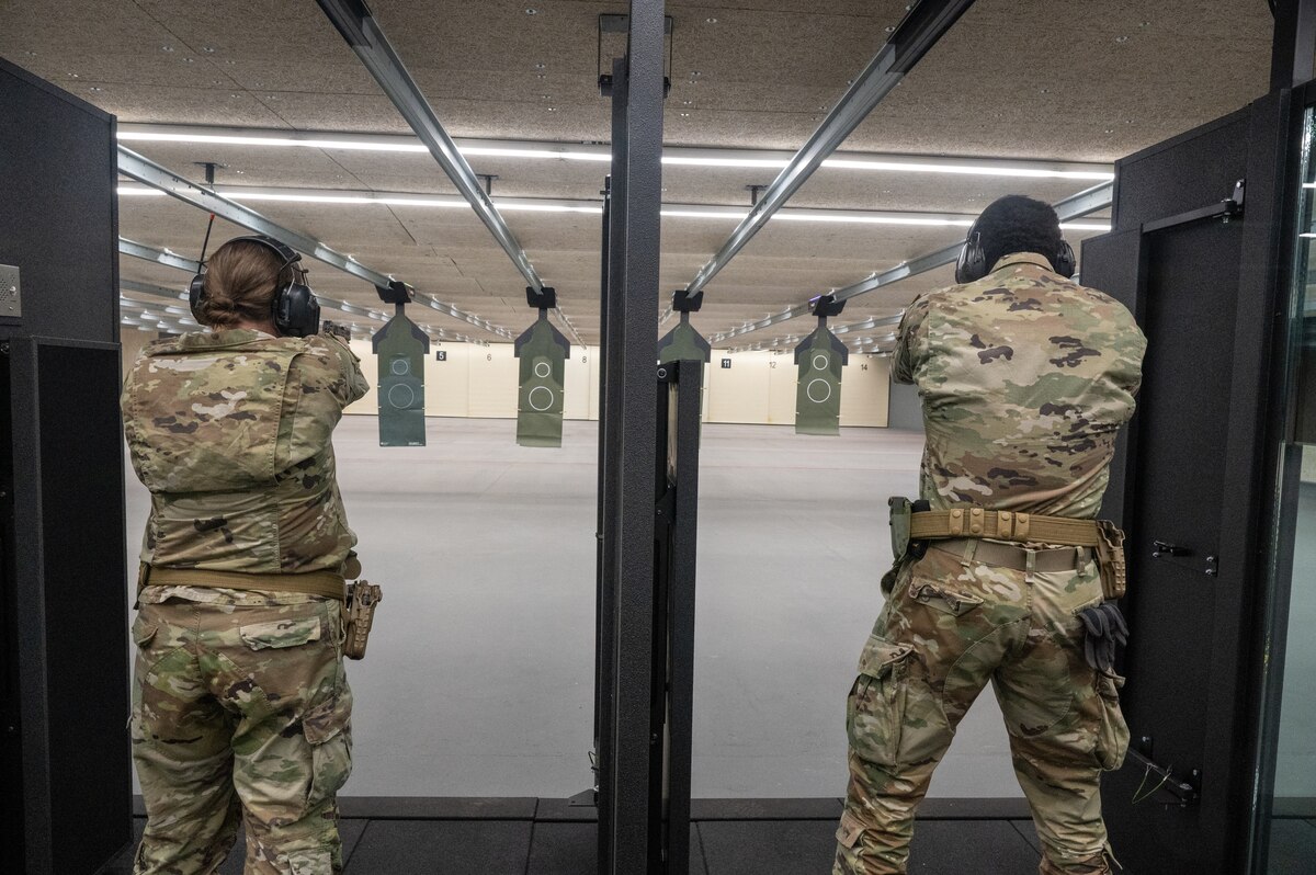 Airmen fire M18 handguns as part of small arms qualification at the new indoor range at Goldwater Air National Guard Base, Phoenix, Oct. 5, 2024. Staying proficient in individual weapon systems keeps Airmen deployable and mission-ready.
