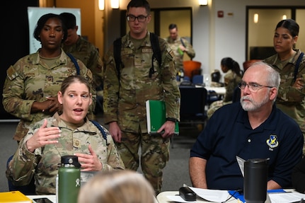 Senior Master Sgt. Michelle LeMond giving speaks to Dr. Brian Davis during Airmanship 200