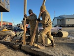 Alaska Organized Militia members assigned to Joint Task Force - Kotzebue help the Arctic Circle community recover from severe flooding Oct. 26, 2024, following a storm. The 11-member team, including  Alaska Air and Army National Guardsmen and the Alaska State Defense Force, was activated by the State Emergency Operations Center.