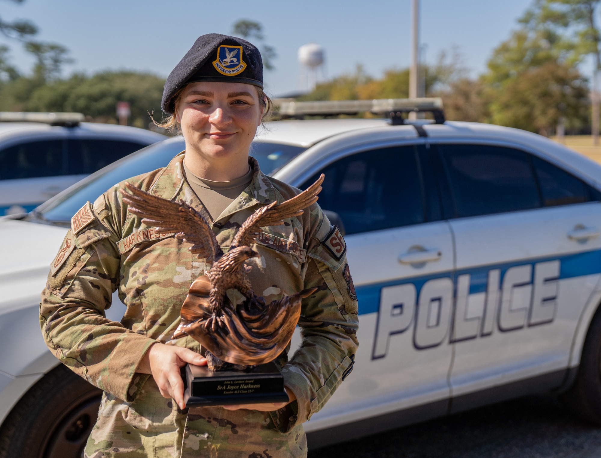 U.S. Air Force Staff Sgt. Joyce Harkness, 81st Security Forces Squadron investigator, poses with the John L. Levitow Award she earned in Airman Leadership School at Keesler Air Force Base, Mississippi, Oct. 24, 2024.