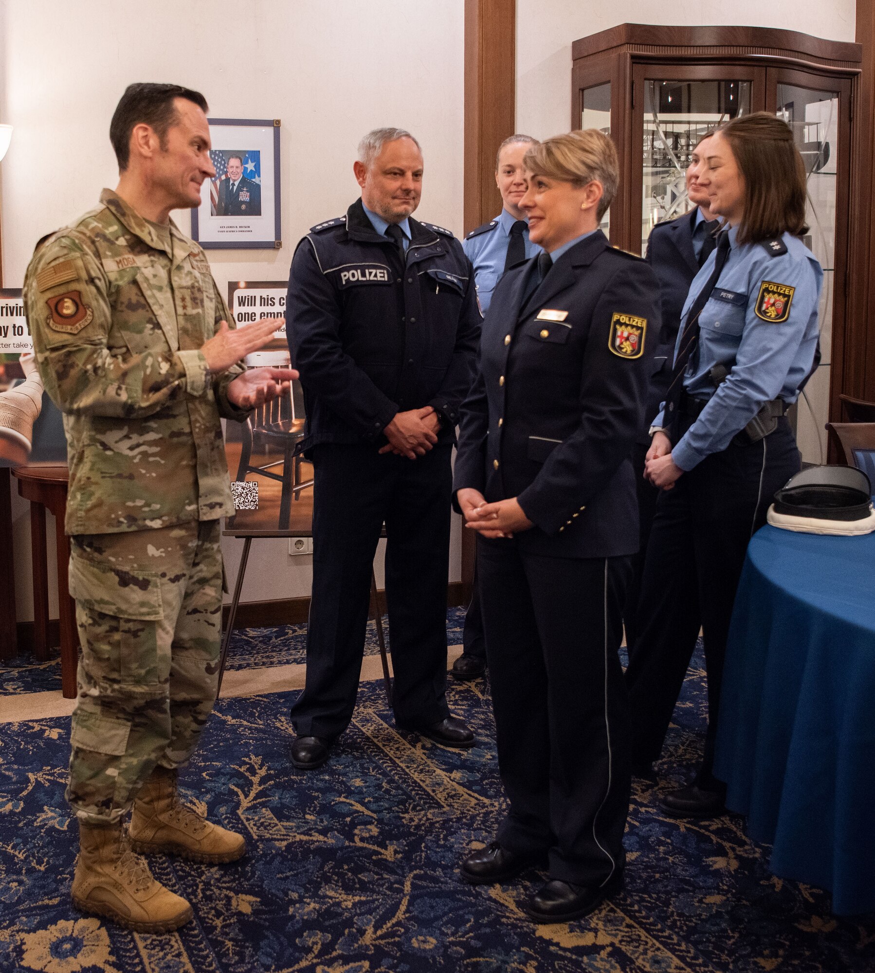 U.S. Air Force Maj. Gen. Paul D. Moga, Third Air Force and Kaiserslautern Military Community commander, and Jacqueline Schröder, Head of Police Inspection Pirmasens, kick off the “Key Moment” campaign that aims to prevent and reduce DUI incidents in the area, at Ramstein Air Base, Germany, Oct. 28, 2024.