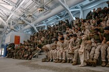 U.S. Marine Corps recruits with Fox Company, 2nd Recruit Training Battalion, prepare for a swim qualification event at Marine Corps Recruit Depot San Diego, California, Oct. 21, 2024. The basic swim qualification consists of a 25-meter swim, tower jump into the water, four-minute tread, 25-meter pack swim, and an underwater gear shed. (U.S. Marine Corps photo by Cpl. Sarah M. Grawcock)