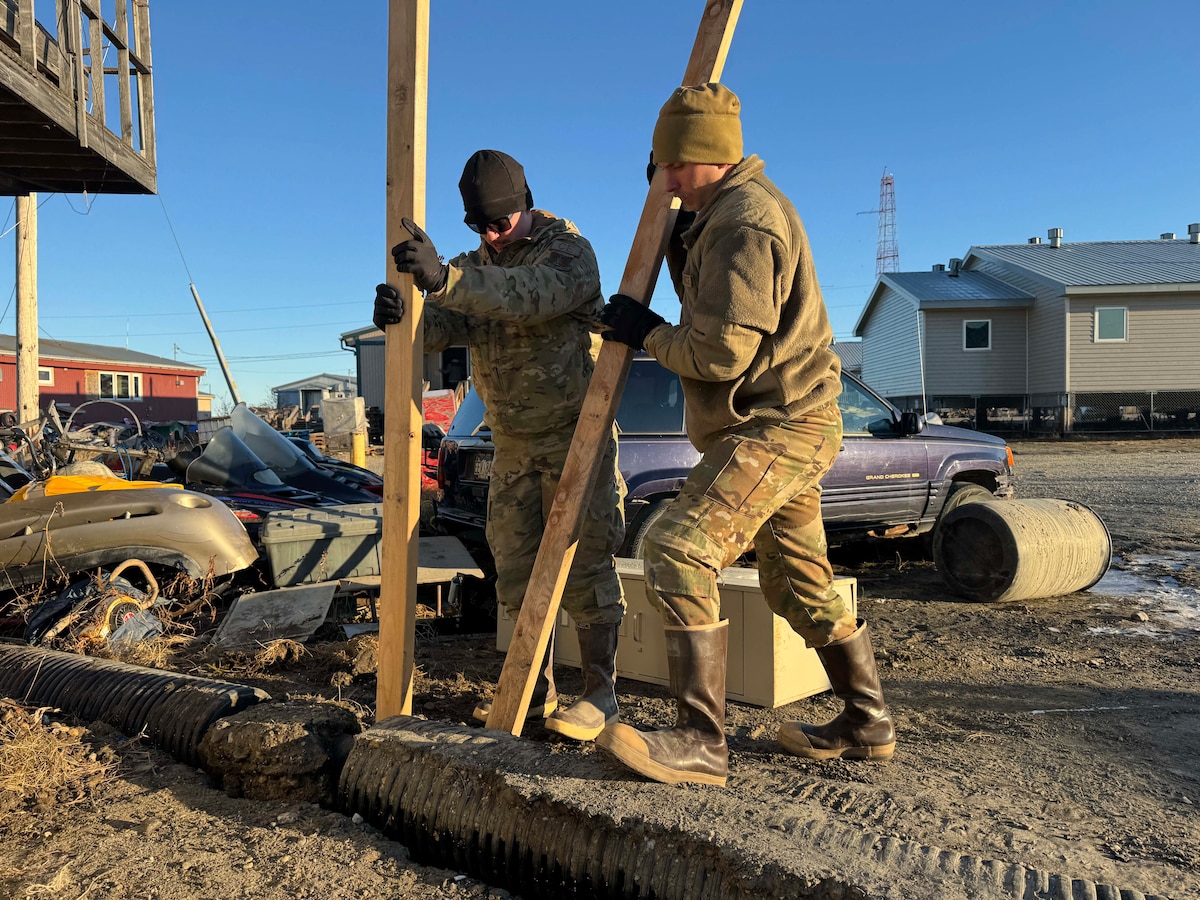 Alaska Organized Militia members assigned to Joint Task Force - Kotzebue help the Arctic Circle community recover from severe flooding Oct. 26, 2024, following a storm. The 11-member team, including  Alaska Air and Army National Guardsmen and the Alaska State Defense Force, was activated by the State Emergency Operations Center.