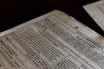 U.S. Marine Corps recruits with Lima Company, 3rd Recruit Training Battalion, receive  record of emergency data forms during a receiving event at Marine Corps Recruit Depot San Diego, California, Oct. 21, 2024. During the receiving process, recruits are checked for contraband, given haircuts, make scripted phone calls home, and are issued gear required for training. (U.S. Marine Corps photo by Lance Cpl. Janell B. Alvarez)