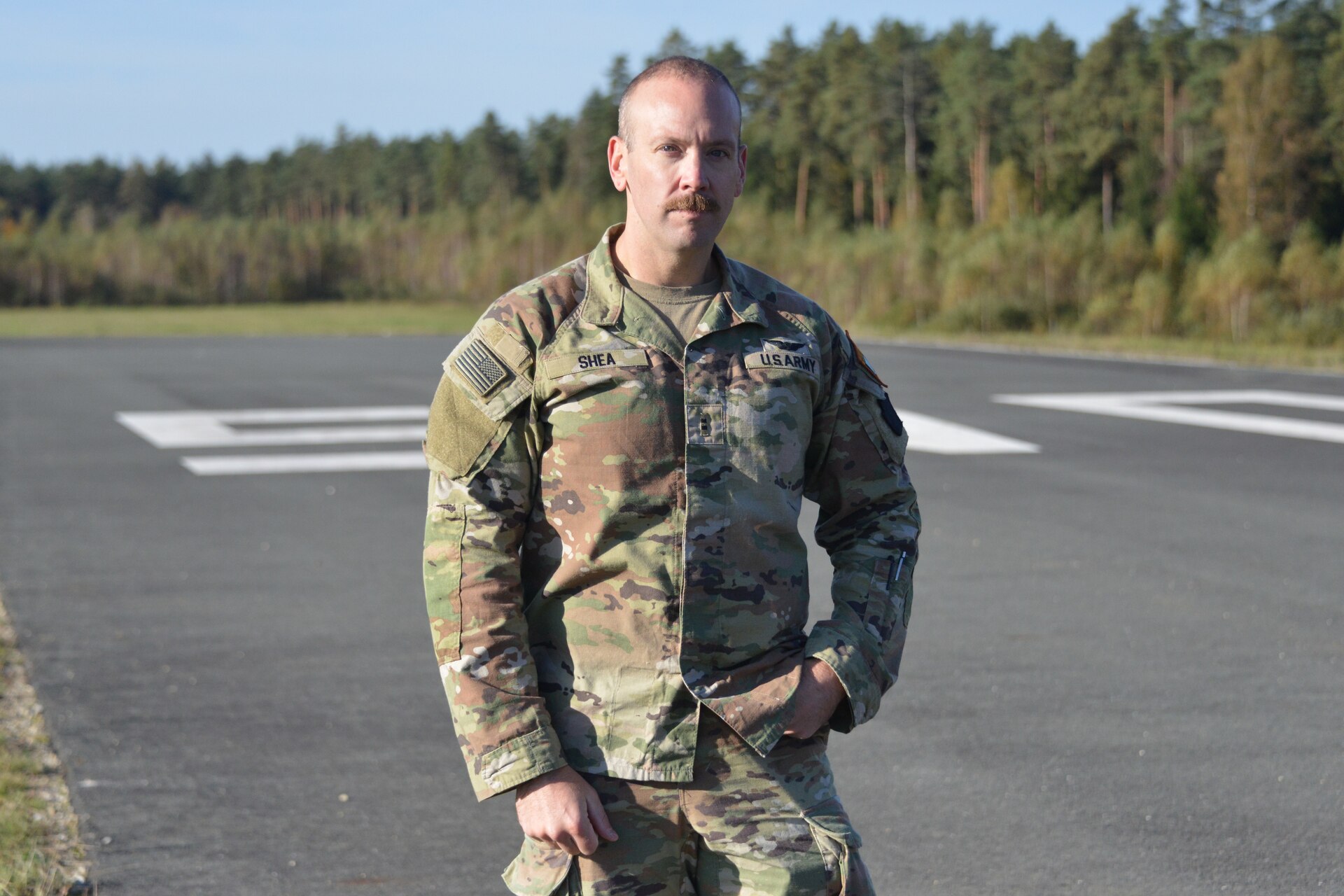 U.S. Army Chief Warrant Officer 2 Nathan Shea, assigned to Headquarters and Headquarters Company, 56th Stryker Brigade Combat Team, 28th Infantry Division, Pennsylvania National Guard poses for a photo at Grafenwoehr Training Area, Germany, Oct. 11, 2024. (U.S. Army National Guard photo by Pfc. Israel Fernandez)