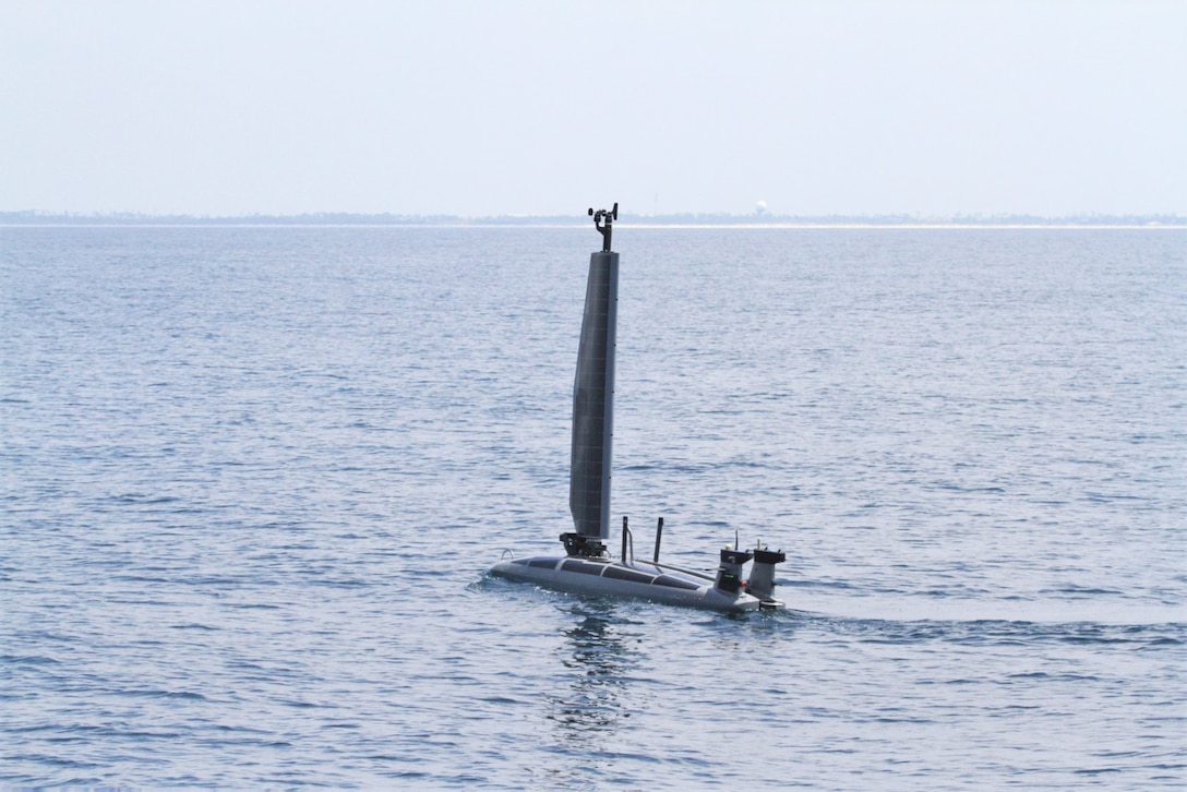 The TRITON unmanned drone operates along the surface on the Florida Gulf Coast Test Ranges, Aug. 15. This exercise successfully integrated multiple unmanned systems from contracting partners to collect and transmit real-time environmental data to a forward-deployed shore station. The experiment also tested novel data exfiltration methods, demonstrated regional partnering, and leveraged prior Navy and non-Navy development efforts to advance subsea warfare (SSW) mission capabilities. (U.S. Navy photo by Eddie Green)