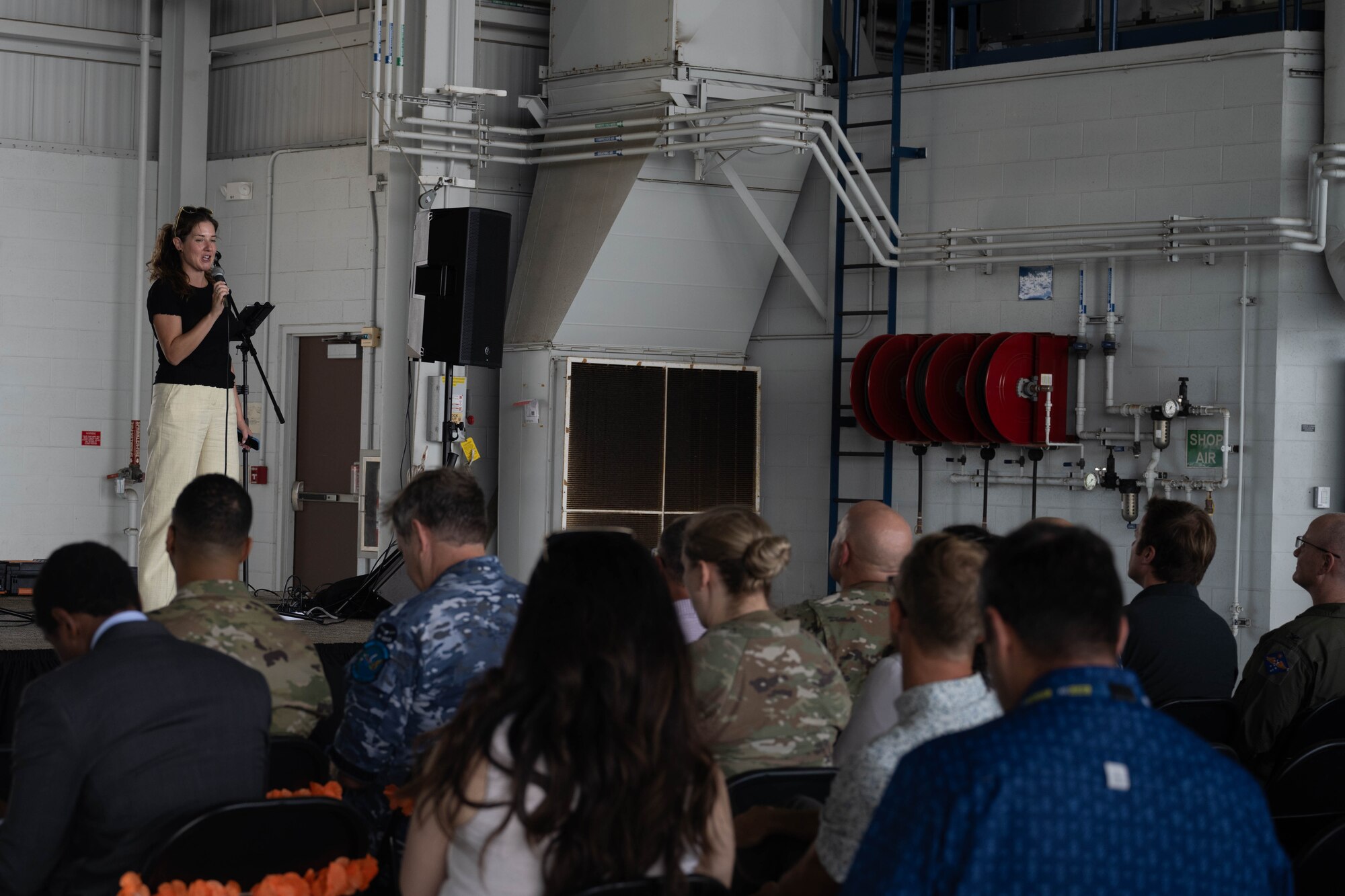 A representative from the National Security Innovation Network addresses Air Force leadership and other company representatives participating in Propel Hawaii 2024 Demo Day on Joint Base Pearl Harbor-Hickam, Hawaii, Oct. 25, 2024. Propel Hawaii highlights solutions designed to boost the operational readiness and combat effectiveness of the U.S. Air Force and its joint partners in the Pacific. (U.S. Air Force photo by Airman 1st Class Aden Brown)