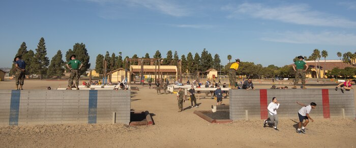 Contestants participate in the 2024 Marine Corps Recruit Depot San Diego Boot Camp Challenge at MCRD San Diego, California, Oct. 19, 2024. For the past 23 years, MCRD San Diego has hosted the bootcamp Challenge, a three-mile obstacle course race guided by 60 drill instructors that highlights the physical and mental demands of bootcamp. The event fosters camaraderie and community engagement through interaction with MCRD personnel. (U.S. Marine Corps photo by Lance Cpl. Janell B. Alvarez)