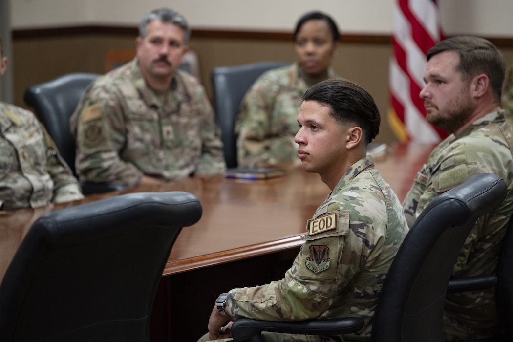 An Airman attends a conference call