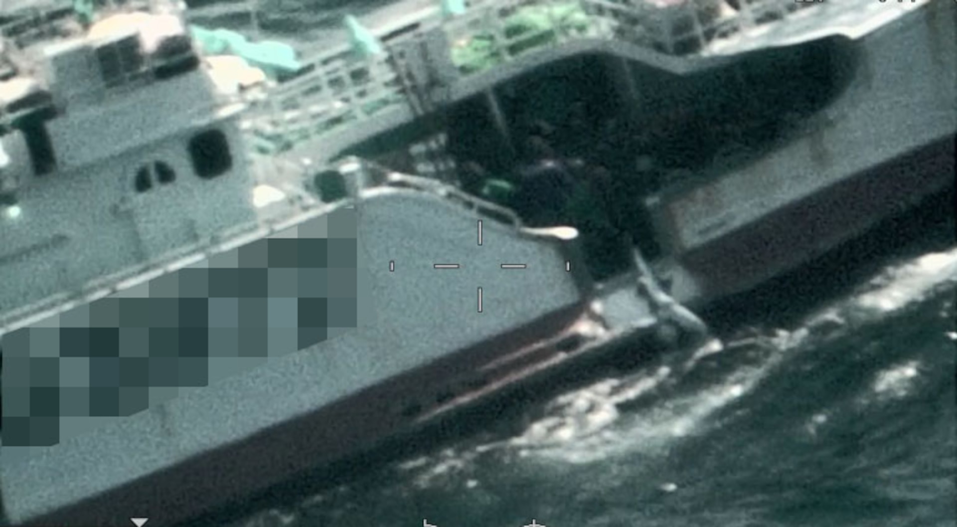 A foreign fishing vessel pulling a shark aboard while conducting shark finning operations in the North Pacific, May 12, 2024. Regional Fisheries Management Organizations regulate the process of shark finning through Conservation and Management Measures. These measures require fully utilizing retained catches of sharks and limits on amounts of fins onboard in relation to those sharks. (U.S. Coast Guard courtesy photo)