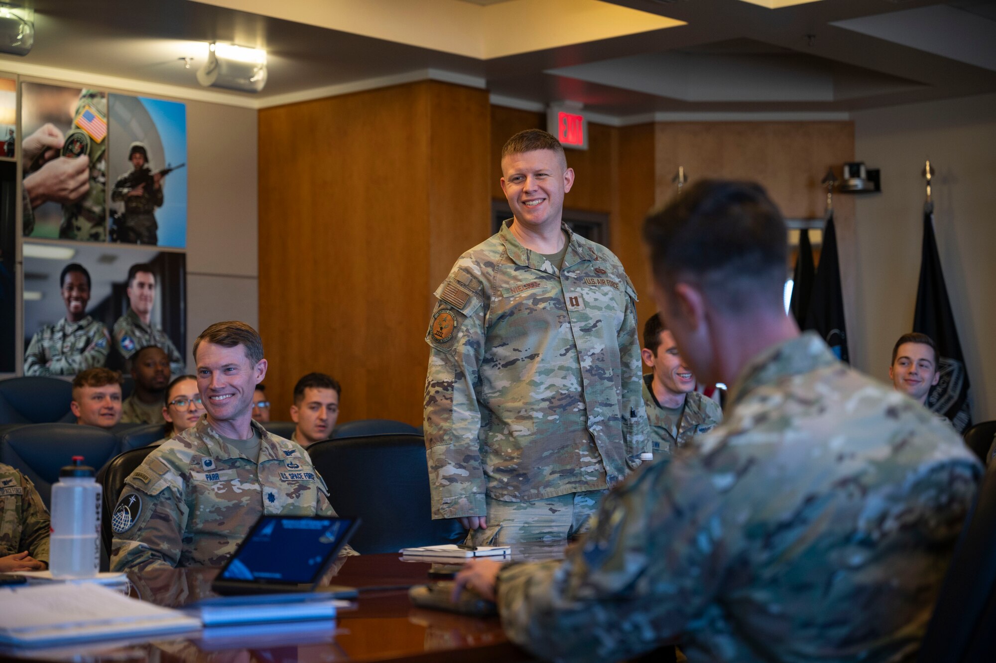 U.S. Air Force Capt. Randy Nielsen, 50th Force Support Squadron deputy flight chief, stands at attention during a joint officer development session at Schriever Space Force Base, Colorado, Oct. 25, 2024. U.S. Air Force Maj. Katie Foote, 50th Contracting Squadron commander, and Maj. Dayne Foot, 50th Security Forces Squadron commander, began this effort to help young officers network with their peers while learning about joint warfighting, leadership and different doctrinal approaches. (U.S. Space Force photo by Staff Sgt. Natalie Rubenak)