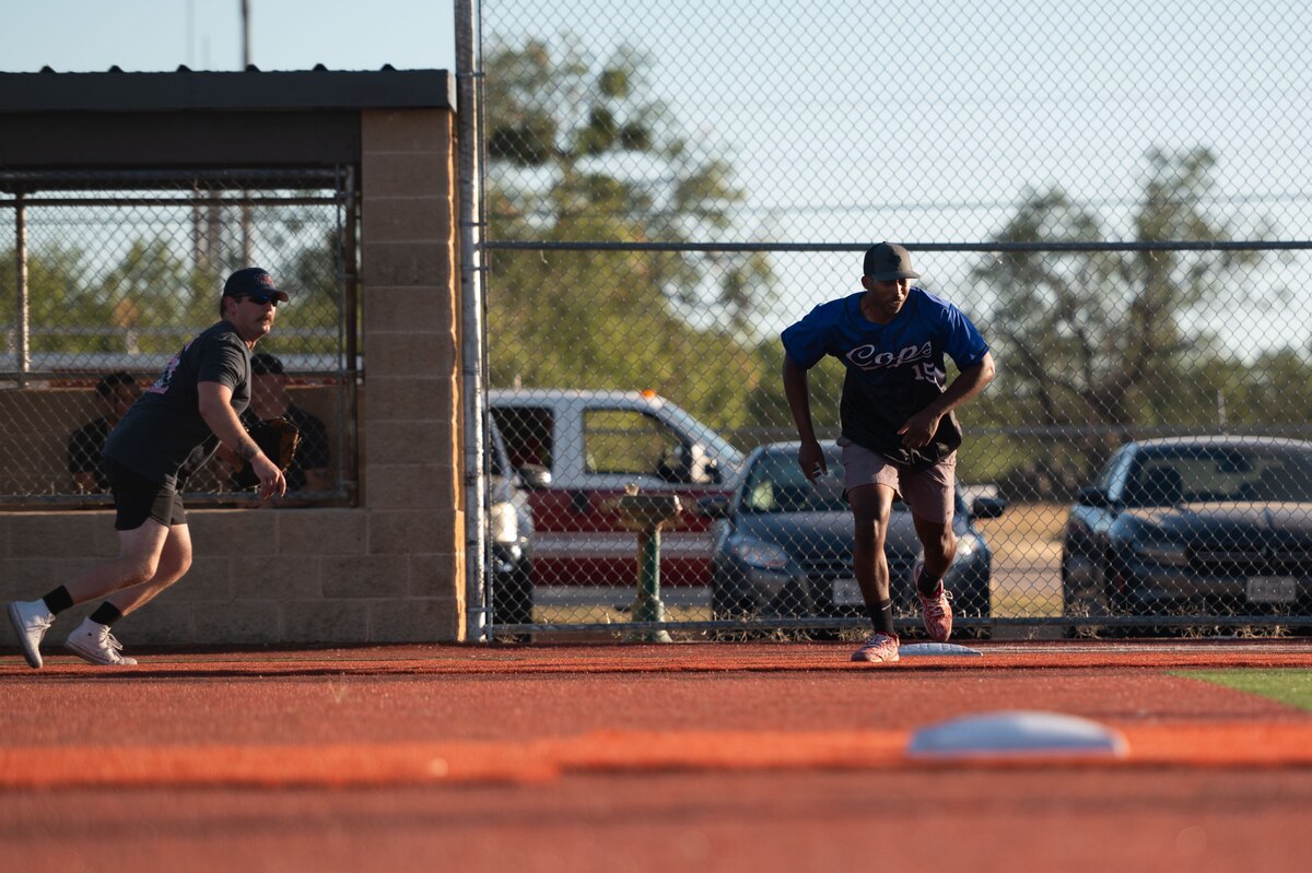 U.S. Air Force Staff Sgt Jared Taylor, 17th Security Forces Squadron flight chief, runs to 2nd base during the Inaugural Battle of the Badges softball game at the Mathis Fitness Center at Goodfellow Air Force Base Texas, Oct. 28, 2024. The 17th SFS team raised 15 pints of blood in donations which was one pint behind the firefighters during the blood drive prior to the game. (U.S. Air Force photo by Airman 1st Class Brian Lummus)