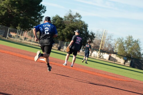 U.S. Air Force Master Sgt. Drew Eaton, 17th Security Forces Squadron Interim Senior Enlisted Leader, runs to 2nd base during the Inaugural Battle of the Badges softball game at the Mathis Fitness Center at Goodfellow Air Force Base Texas, Oct. 28, 2024. Battle of the Badges is an annual event among first responders to raise awareness to the importance of donating blood. (U.S. Air Force photo by Airman 1st Class Brian Lummus)