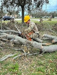 Soldiers with the Louisiana National Guard’s 843rd Engineer Battalion, 225th Engineer Brigade, clear debris in Manatee, Florida, Oct. 16, 2024.