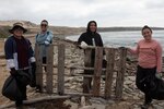 Sailors and civilians participate in an annual coastal cleanup on San Nicolas Island.