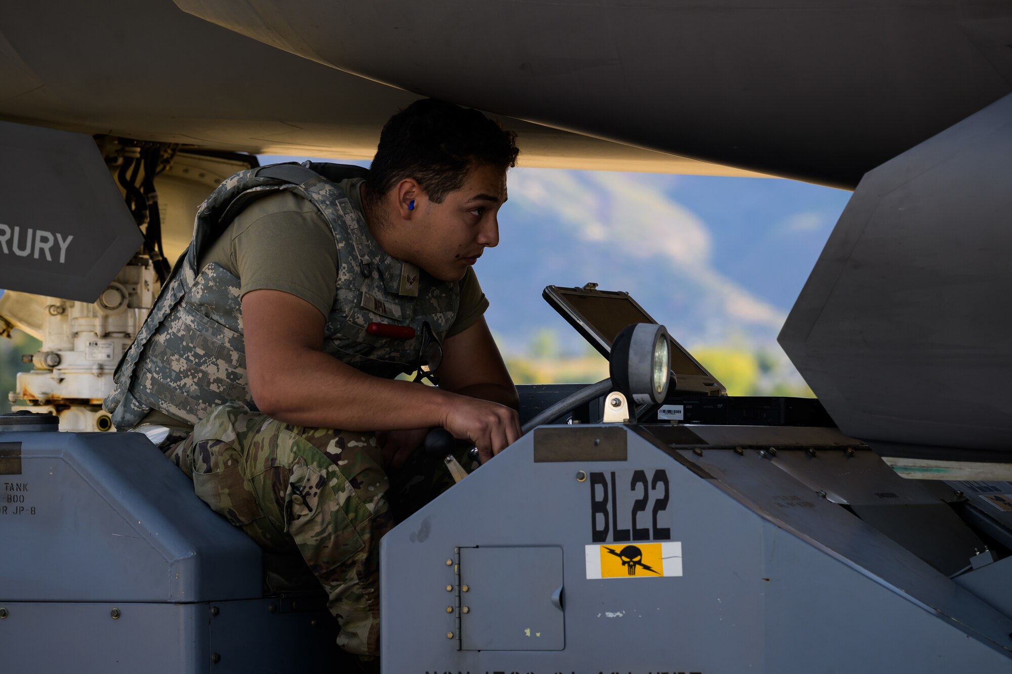 A photo of maintenance Airmen loading and fueling and preparing an F-35A Lightning II for launch.