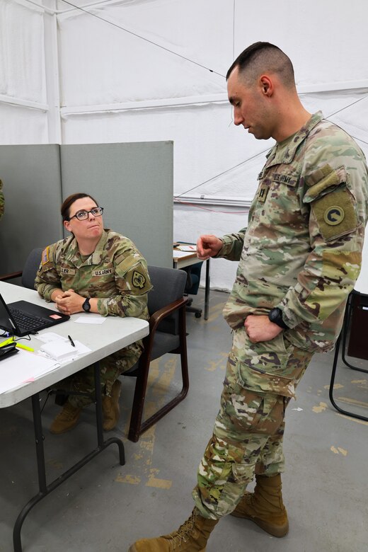Capt. Andrew Vanner, deputy G6, 1st Theater Sustainment Command, participates in training with Maj. Allison Miller, S6 OIC, 17th Sustainment Brigade, October 10, 2024, Fort Cavazos, Texas. The 17th SB will soon deploy for a 9-month rotation in U.S. Central Command area of responsibility.