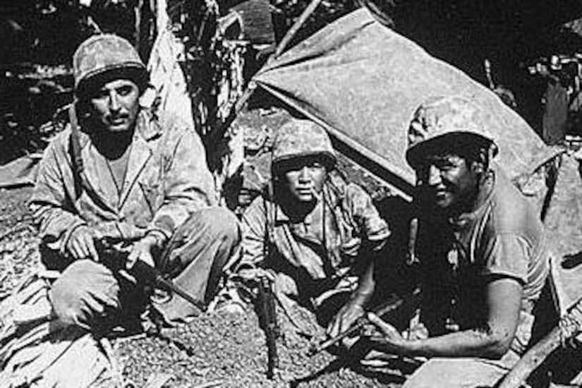 Native American men pose for a photo during World War II.