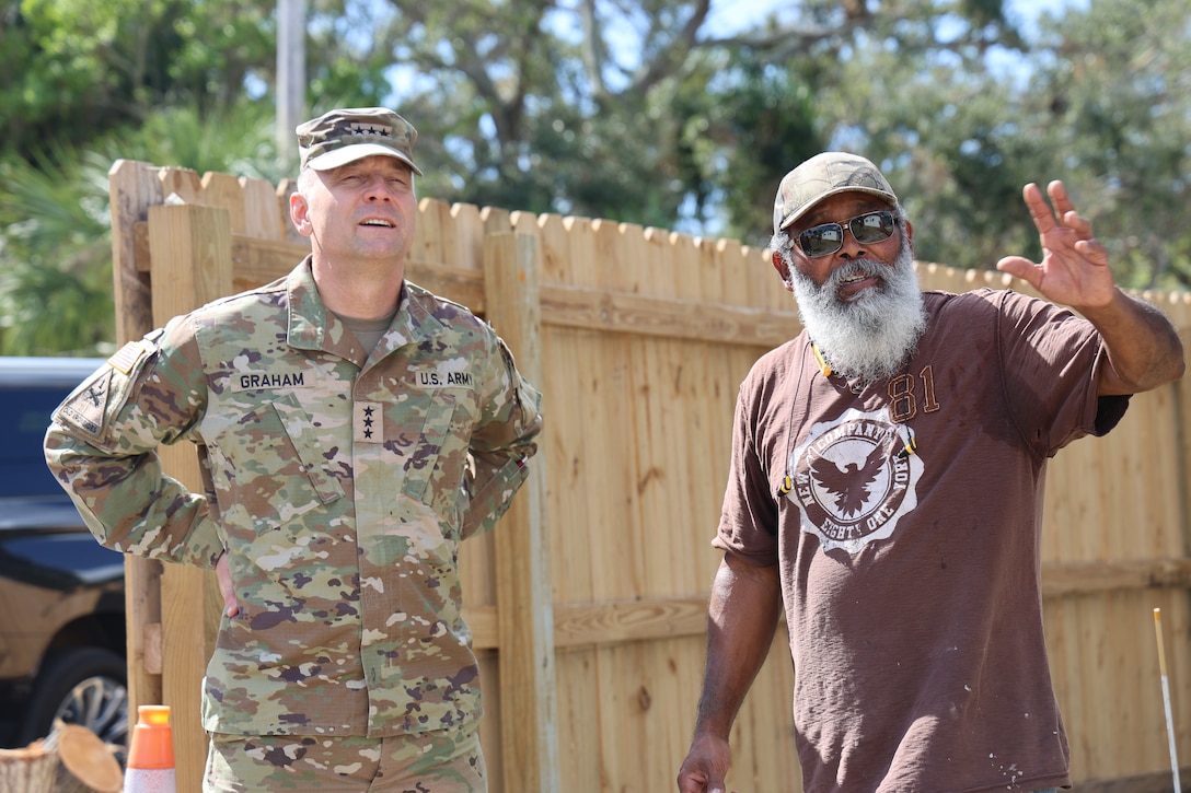 U.S. Army Corps of Engineers Jacksonville District Deputy Commander, Maj. Matt Westcott, District Commander, Col. Brandon Bowman and Chief of Engineers Lt. Gen. William H. Graham discuss the Hurricane Milton Blue Roof mission Oct. 29 at the Emergency Field Office in Sarasota, Florida. During Graham’s visit, he recognized several members for their stellar efforts on the Operation Blue Roof program and the general response. He also met with a homeowner from the Sarasota community who recently had a Blue Roof installed. (U.S. Army photo by Brooks O. Hubbard, U.S. Army Corps of Engineer)