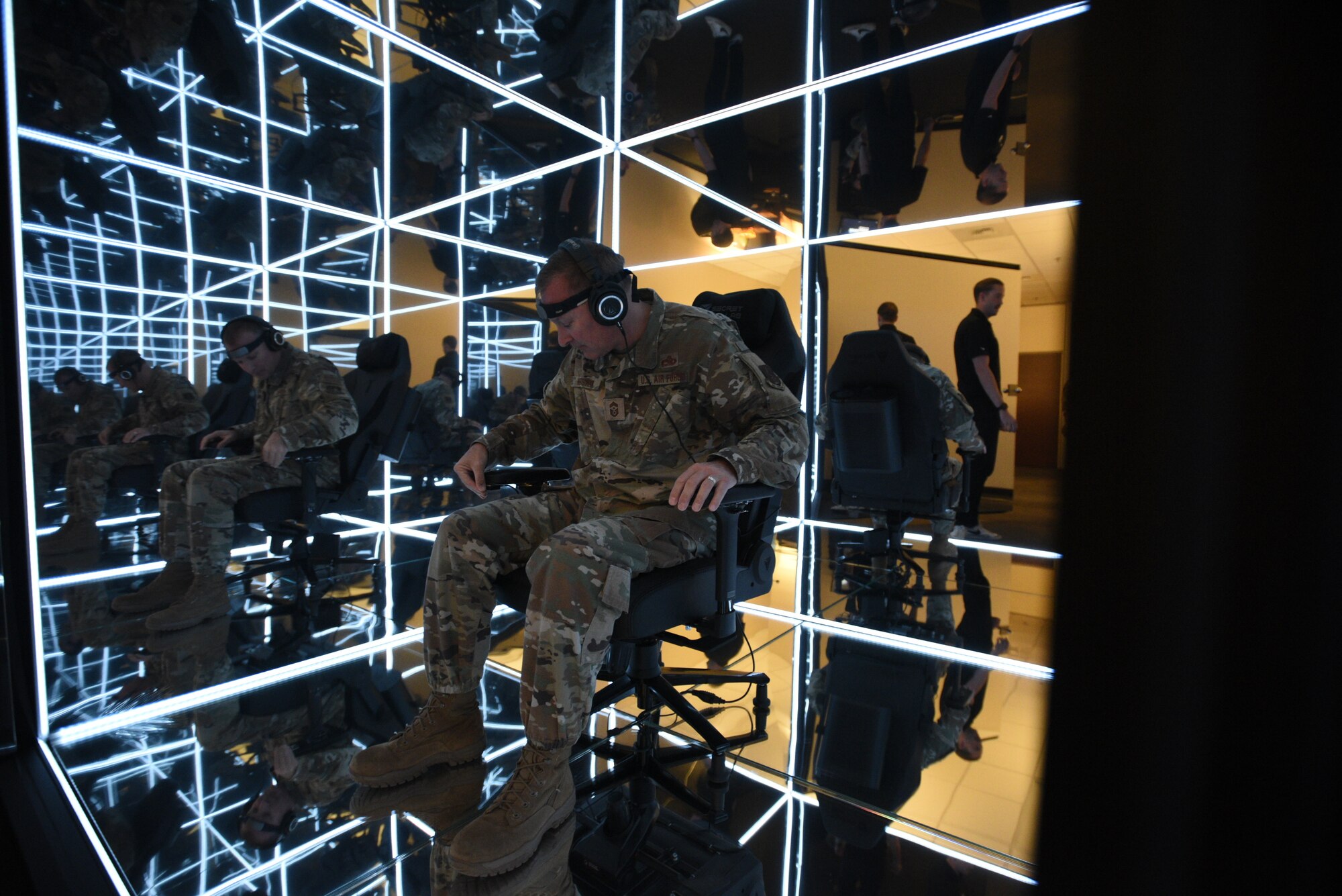 141st Air Refueling Wing Command Chief Master Sgt. Steven Webster tests the first ever Air National Guard owned MindGym, after its installation on October 3, 2024, at Fairchild Air Force Base, Washington. MindGym by Lumena is a sensory immersive cube that was created around neurofeedback, focused attention meditation, sensory deprivation and binaural beats. (U.S. Air Force Photo by Mass Communicator Tech. Sgt. Michael Brown)