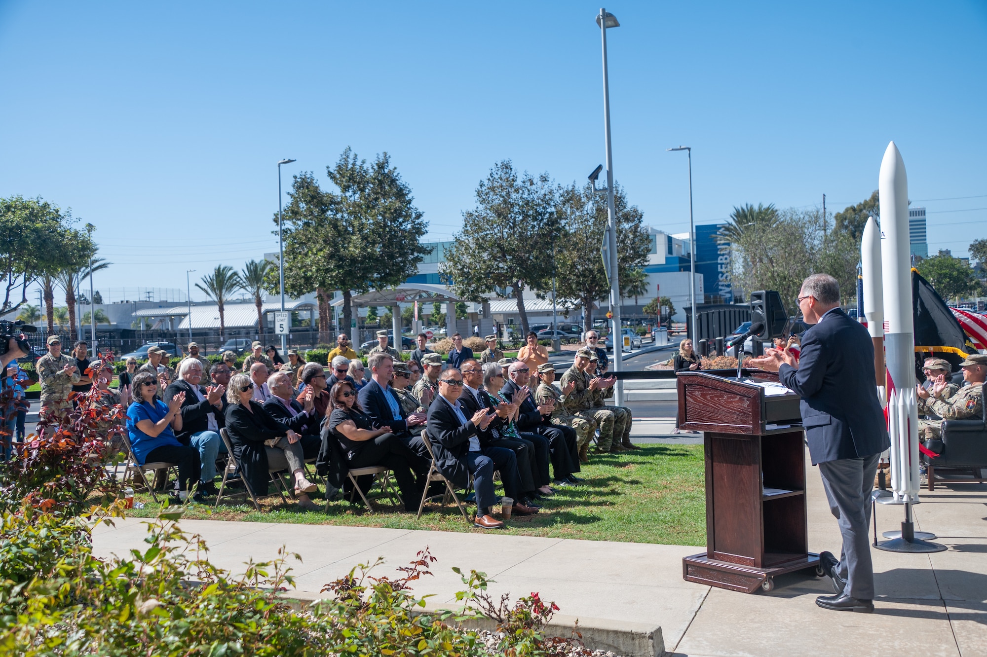 Members of Space Systems Command and guests applaud during the dedication of the Centaur III upper stage and its associated RL10 rocket engine exhibit at Los Angeles Air Force Base, Calif., Oct. 18, 2024. The Centaur upper stage, dubbed “America’s Workhorse in Space,” has played a vital role in U.S. efforts in space since the 1960s from the exploration of every planet in the solar system to launching entire satellite constellations, serving as sentinels for national defense. (U.S. Space Force photo by Van Ha)