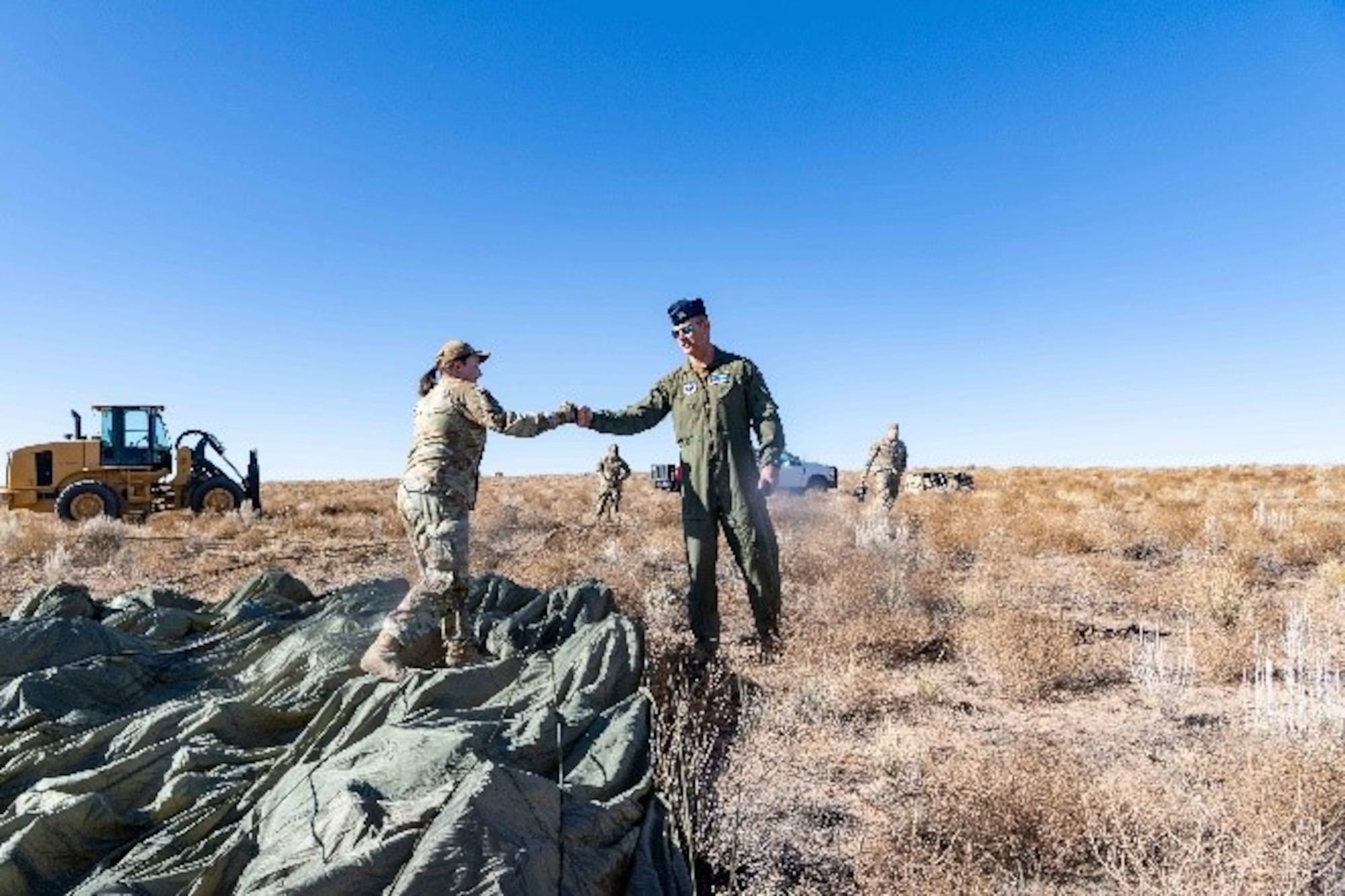 The 58th Special Operation Wing conducted aerial deliveries at their new Howard Drop Zone near the Albuquerque airport, Double Eagle II, Oct. 30. Col Joshua Jackson, 58th SOW, Deputy commander thanks members of the 58th SOW for their support and contributions to the aerial delivery operations.
(U.S. Air Force photo by Allen Winston)