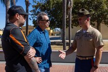 U.S. Marine Corps Sgt. Maj. John Miller, right, sergeant major of Recruit Training Regiment, Marine Corps Recruit Depot San Diego, meets with Terry and Dustin Bringham, the son and grandson of the late Capt. Gary L. Bringham at MCRD San Diego, California, Oct. 21, 2024. From 1962 to 1965, Gary Bringham served as a drill instructor at MCRD San Diego before commissioning and retiring as a captain. The Bringham family toured the depot to learn more about his role as a drill instructor and the significance of training recruits. (U.S. Marine Corps photo by Cpl. Alexander O. Devereux)