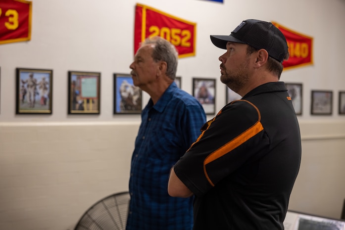 Terry and Dustin Bringham, the son and grandson of the late Capt. Gary L. Bringham, tour the Marine Corps Recruit Depot San Diego Command Museum at MCRD San Diego, California, Oct. 21, 2024. From 1962 to 1965, Gary Bringham served as a drill instructor at MCRD San Diego before commissioning and retiring as a captain. The Bringham family toured the depot to learn more about his role as a drill instructor and the significance of training recruits. (U.S. Marine Corps photo by Cpl. Alexander O. Devereux)