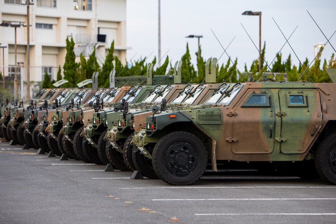 Japan Ground Self-Defense Force Komatsu light armored vehicles with the 13th Reconnaissance Combat Battalion, 13th Brigade, Middle Army, are staged during exercise Keen Sword 25 at Marine Corps Air Station Iwakuni, Japan, Oct. 25, 2024. Keen Sword is a biennial, joint and bilateral field-training exercise involving U.S. military and Japan Self-Defense Force personnel, designed to increase readiness and interoperability while strengthening the ironclad U.S.-Japan alliance. (U.S. Marine Corps photo by Sgt. Isaac Orozco)