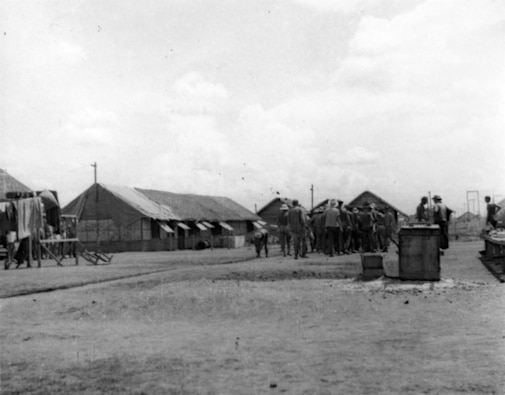 A rare photograph of Allied POWs marching in formation at Cabanatuan Prison in the early 1940s.