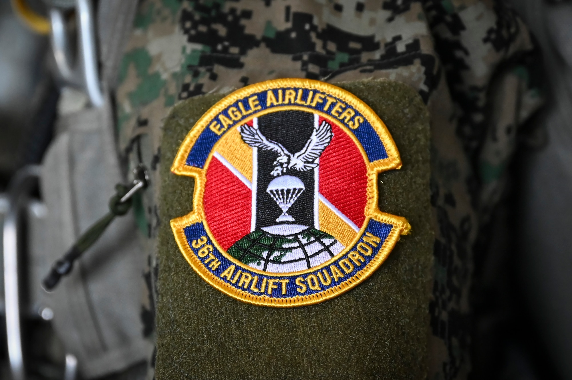 A 36th Airlift Squadron patch is displayed on the uniform of a Republic of Korea Special Warfare Command Soldier from the 1st Special Forces Brigade, during high-altitude, high-opening proficiency jump training in preparation for Freedom Flag 24-1 at Kunsan Air Base, Republic of Korea.