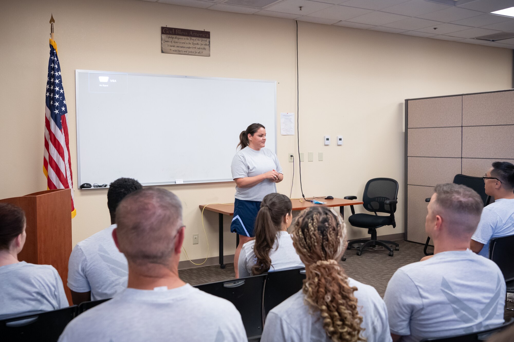 Lt. Col. Sarah Cossette, 944th Medical Squadron chief of nursing services, speaks to fellow squadron members prior to a squadron achievement celebration at Luke Air Force Base, Ariz., Oct. 20, 2024. The squadron celebrated 14 consecutive months without a single physical fitness test failure, a milestone achieved through camaraderie and a shared commitment to readiness. (U.S. Air Force photo by Tech. Sgt. Tyler J. Bolken)