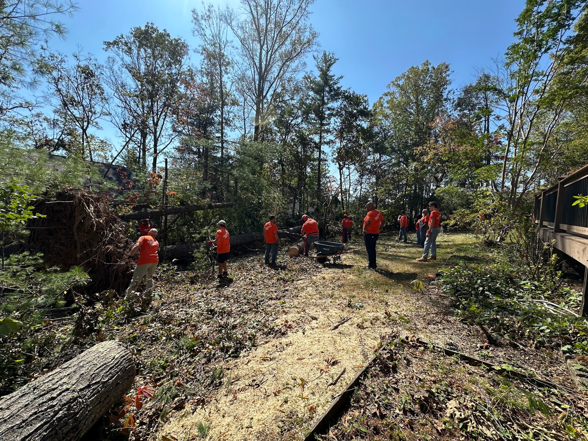 Volunteers with Samaritan’s Purse assist with tree removal after the devastation of Hurricane Helene in western North Carolina October 8, 2024. These volunteers are just a few of the thousands of people who have served through the organization in the western North Carolina relief effort. (Courtesy Photo)