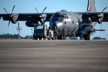 U.S. Airmen, assigned to the 4th Special Operations Aircraft Maintenance Squadron, tow an AC-130J Ghostrider gunship after a wash at Hurlburt Field, Florida, Oct. 23, 2024.