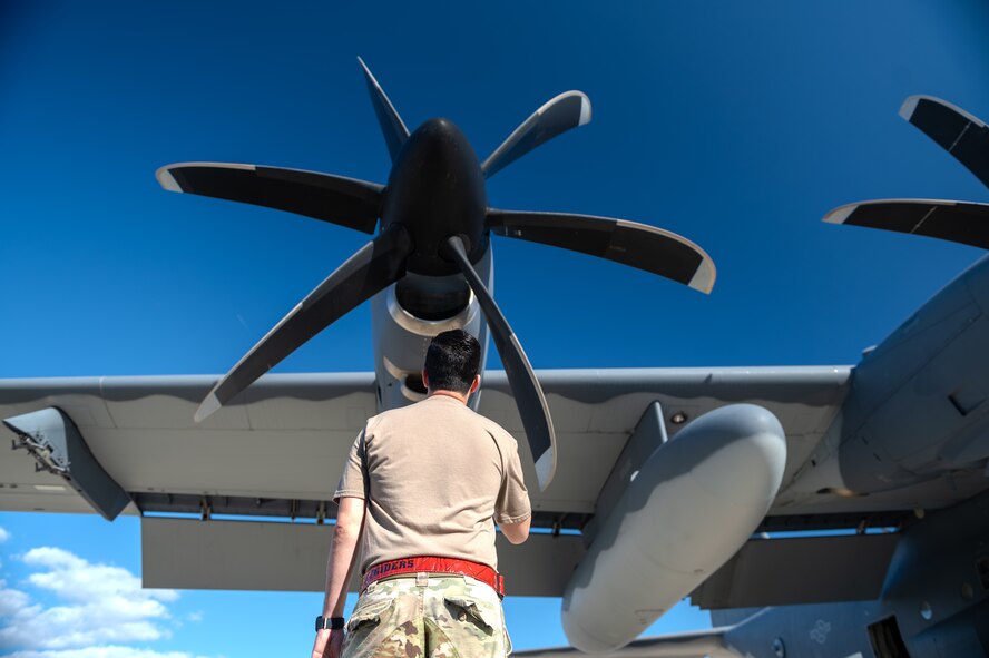 A U.S. Airman, assigned to the 4th Special Operations Aircraft Maintenance Squadron, conducts a pre-flight visual inspection of the props on an AC-130J Ghostrider gunship at Hurlburt Field, Florida, Oct. 23, 2024.