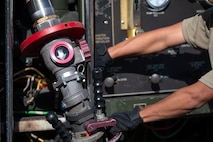 U.S. Air Force Airman 1st Class Eduardo Falcon, a 1st Special Operations Logistics Readiness Squadron fuels apprentice, prepares to fuel an AC-130J Ghostrider gunship at Hurlburt Field, Florida, Oct. 23, 2024.