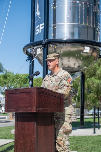 U.S. Air Force Lt. Col. Sean Granier, commander of the 61st Civil Engineer and Logistics Squadron, gives remarks during the ribbon cutting ceremony for the Centaur III propellant tank artifact dedication at Los Angeles Air Force Base, Calif., Oct. 18, 2024. The 61 CELS was integral in the installation of the display which came as the culmination of a multi-year effort made possible by the collaboration between the U.S. Space Force, the U.S. Air Force, industry partners and the Space and Missile Heritage Center supporting the command’s public history and educational missions. (U.S. Space Force photo by Van Ha)