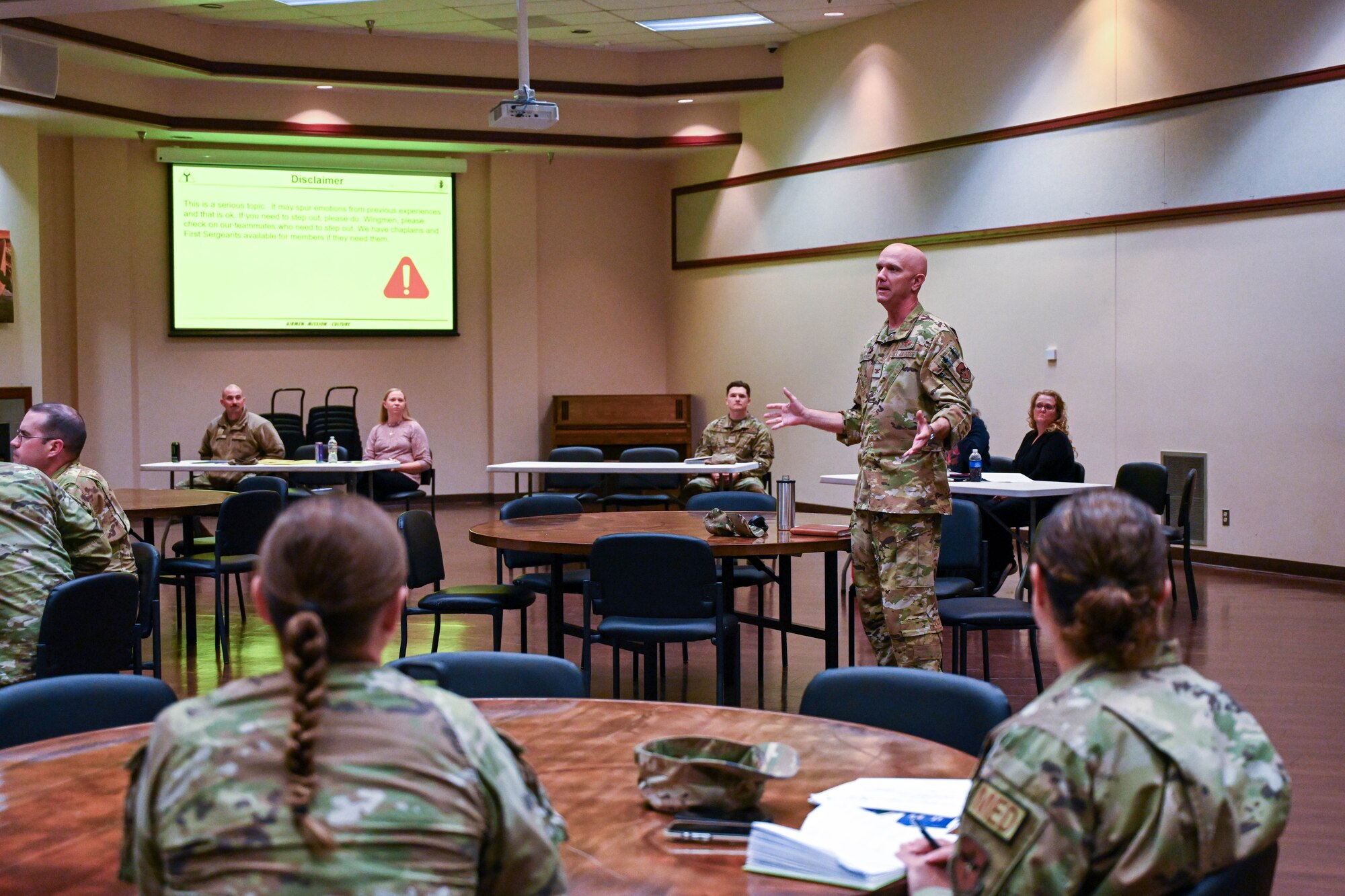 U.S. Air Force Col. Jeff Marshall, 97th Air Mobility Wing commander, addresses leaders from across the 97th Air Mobility Wing during a casualty response exercise at Altus Air Force Base, Oklahoma, Oct. 21, 2023. The exercise gave squadron and group commanders a chance to practice their ability to respond to potential incidents involving fatalities. (U.S. Air Force photo by Senior Airman Miyah Gray)