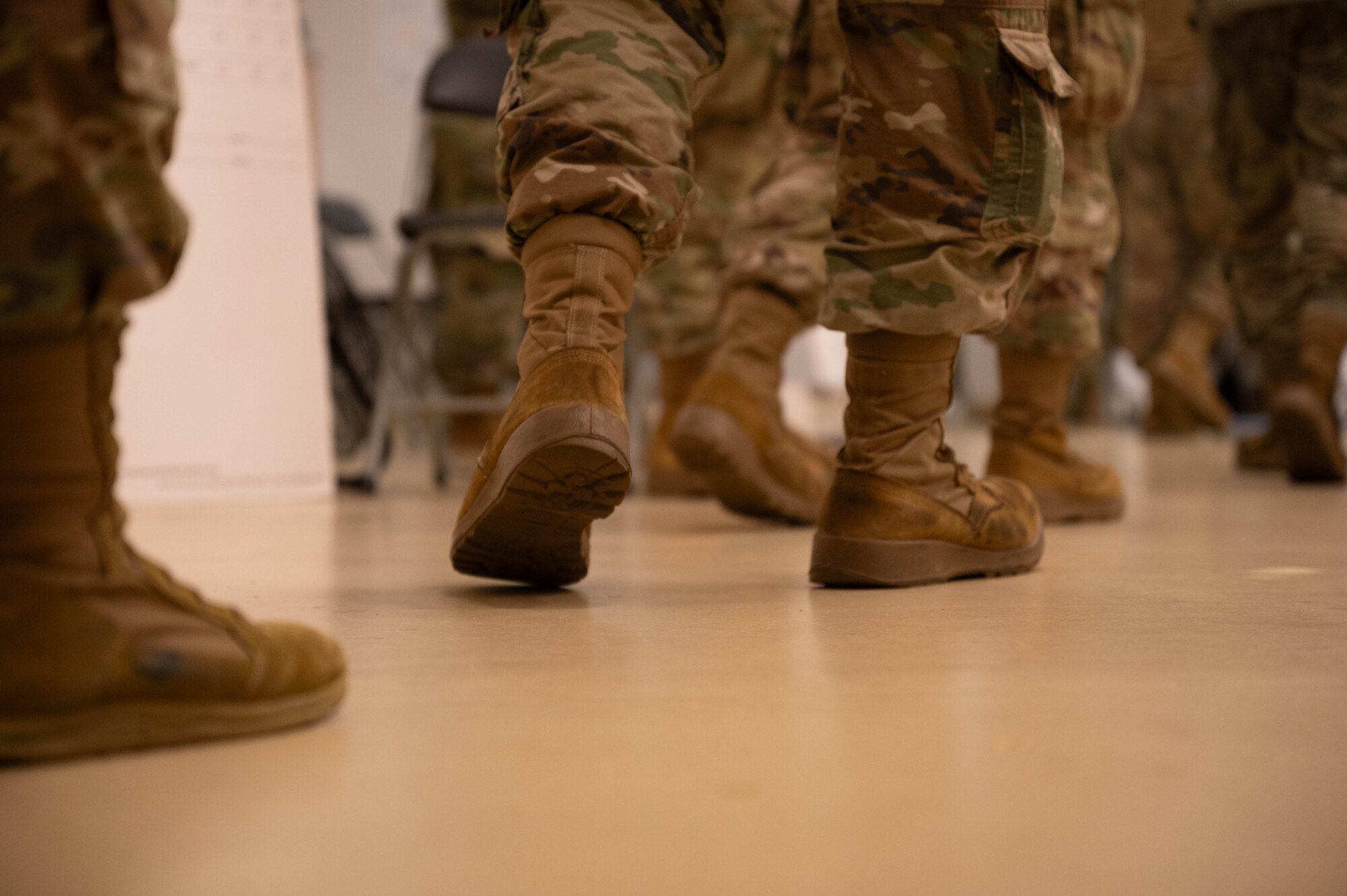 service members line up for flu shot