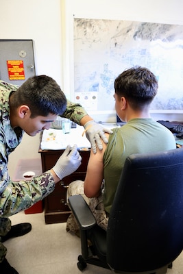 Sailors and hospital staff from Navy Medicine Readiness and Training Command (NMRTC) Twentynine Palms conduct a Shot Exercise (SHOTEX) session from Oct. 15–28, providing influenza vaccinations to personnel across various non-deployable units at the Marine Corps Air Ground Combat Center (MCAGCC). This particular session of a wider SHOTEX primarily focused on supporting the Marine Corps Communications-Electronics School (MCCES), with vaccinations also being administered to the Marine Corps Logistics Operations Group (MCLOG), Tactical Training Exercise Control Group (TTECG), Marine Air Ground Task Force Training Command (MAGTFTC), Headquarters Battalion, and other units U.S. Navy photo by Christopher C. Jones, NHTP/NMRTC Twentynine Palms public affairs officer).