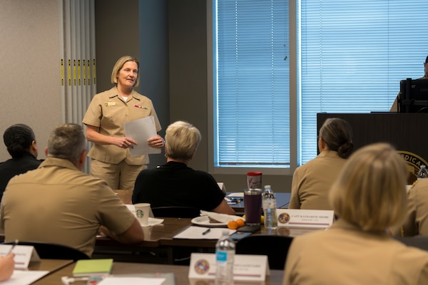 Capt. Katharine Shobe, commanding officer of the Naval Medical Leader and Professional Development Command, addresses attendees at this year's Naval Medical Forces Development Command annual commander's conference at Joint Base San Antonio, Texas, Oct. 22-23, 2024. The conference brought NMFDC Region leaders together to discuss how the can leverage innovation and technology to better develop and deliver trained medical forces to the U.S. Navy. (U.S. Navy photo by Malcolm McClendon)