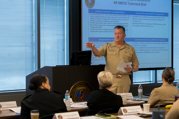 Rear Adm. Walter Brafford, commander of the Naval Medical Forces Development Command, addresses attendees at this year's NMFDC's annual commander's conference at Joint Base San Antonio, Texas, Oct. 22-23, 2024. The conference brought NMFDC Region leaders together to discuss how the can leverage innovation and technology to better develop and deliver trained medical forces to the U.S. Navy. (U.S. Navy photo by Malcolm McClendon)