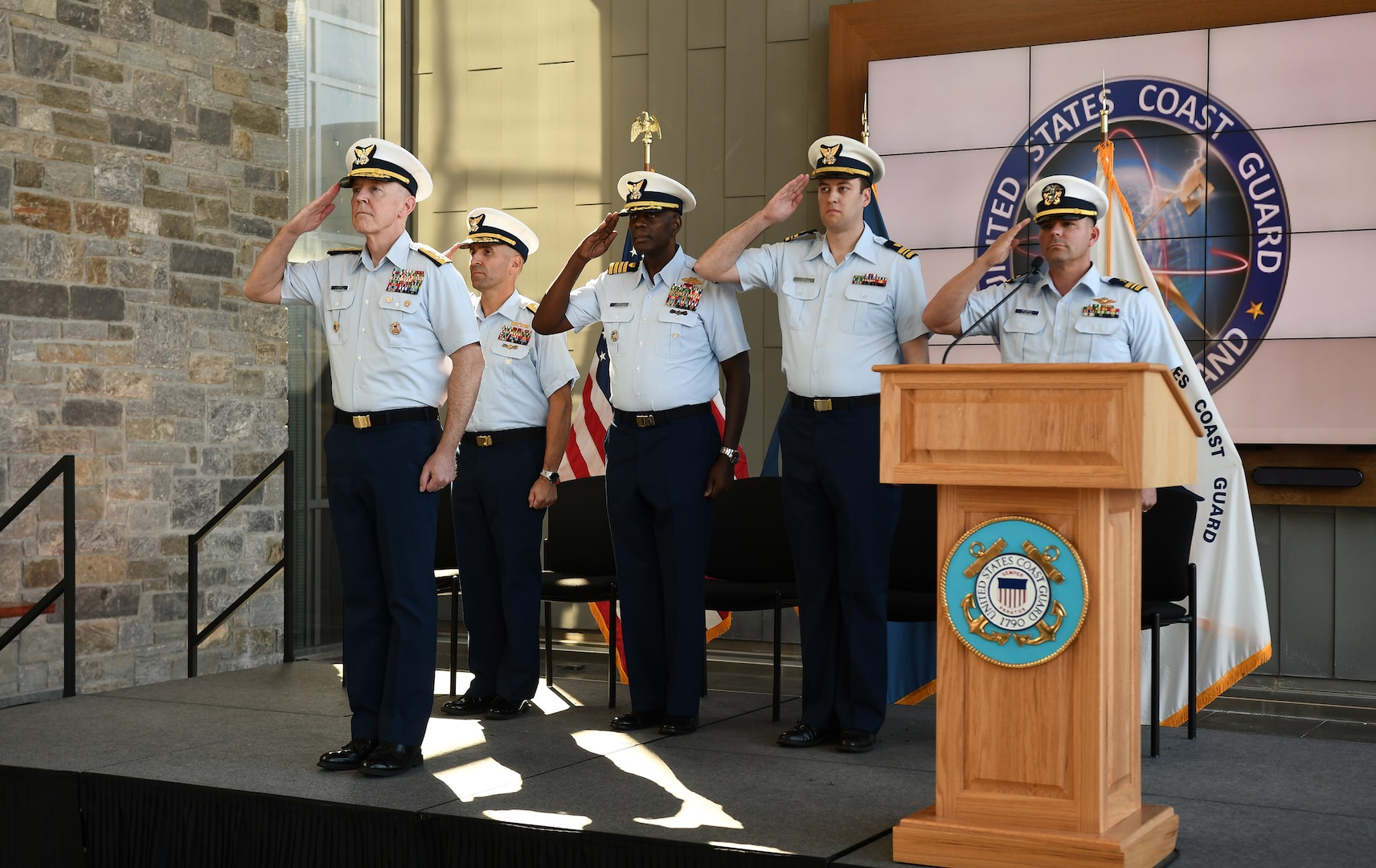 The Coast Guard established its first two reserve cyber units at a ceremony in Washington, D.C. on October 18, 2024. From left to right:  Vice Commandant, Adm. Kevin Lunday, Rear Admiral Jason Tama, Capt. Ronzelle L. Green, Commanding Officer, Coast Guard Reserve Unit (CGRU) U.S. Cyber Command, Lt. Cmdr. Nathaniel Toll, Commanding Officer 1941 CPT, Lt. Cmdr. Matthew E. McGarity, USCG BNCR Chaplain.