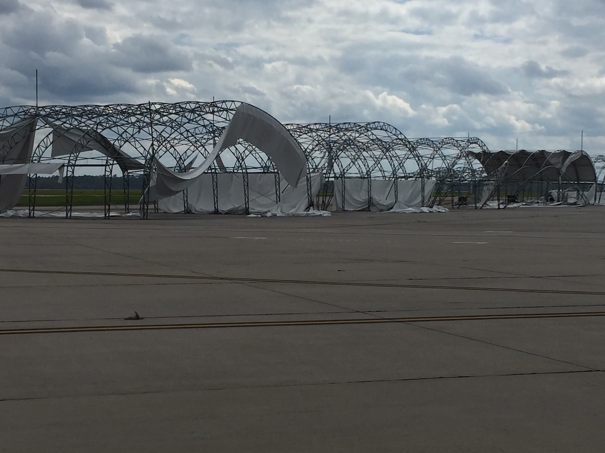 Damaged fabric aircraft sunshades from major storm