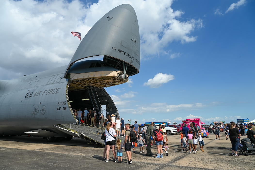 Guests at the Wings Over Houston Airshow line up for a rare opportunity to go inside a 433rd Airlift Wing C-5M Super Galaxy at Ellington Airport, Houston, Texas Oct. 26, 2024.