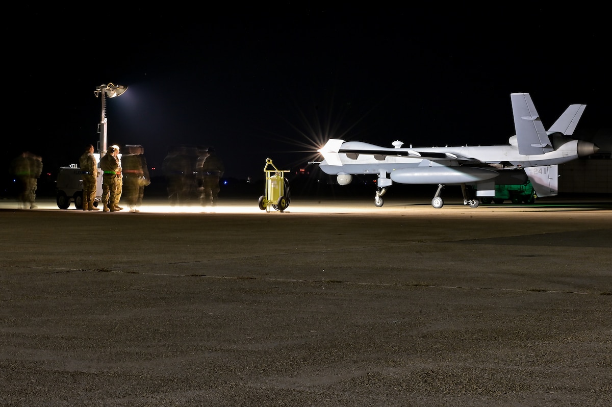 Maintenance personnel standby before an MQ-9 Reaper takes off in support of Freedom Flag 24-1 at Kunsan Air Base, Republic of Korea, Oct. 30, 2024. Freedom Flag 24-1 is an advanced, large-scale tactical exercise between the U.S. and allied partners focused to improve overall collective readiness and effectiveness of our air forces. (U.S. Air Force photo by Tech. Sgt. Stephanie Serrano)