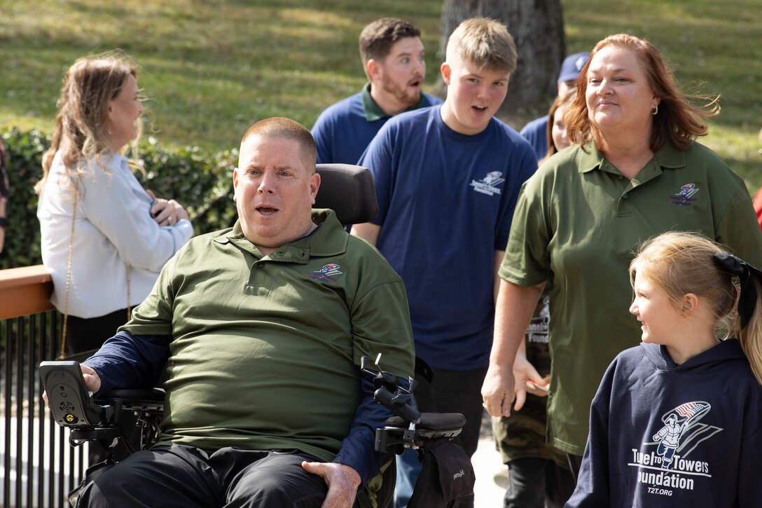 Kentucky National Guardsman, Maj. John Rock and his family cut the ribbon on their new ADA compliant home, Oct. 28, courtesy of the Tunnel to Towers Foundation, a non-profit organization founded following the terrorist attacks of September 11, 2001.