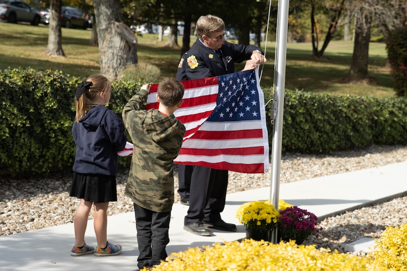 Kentucky National Guardsman, Maj. John Rock and his family cut the ribbon on their new ADA compliant home, Oct. 28, courtesy of the Tunnel to Towers Foundation, a non-profit organization founded following the terrorist attacks of September 11, 2001.