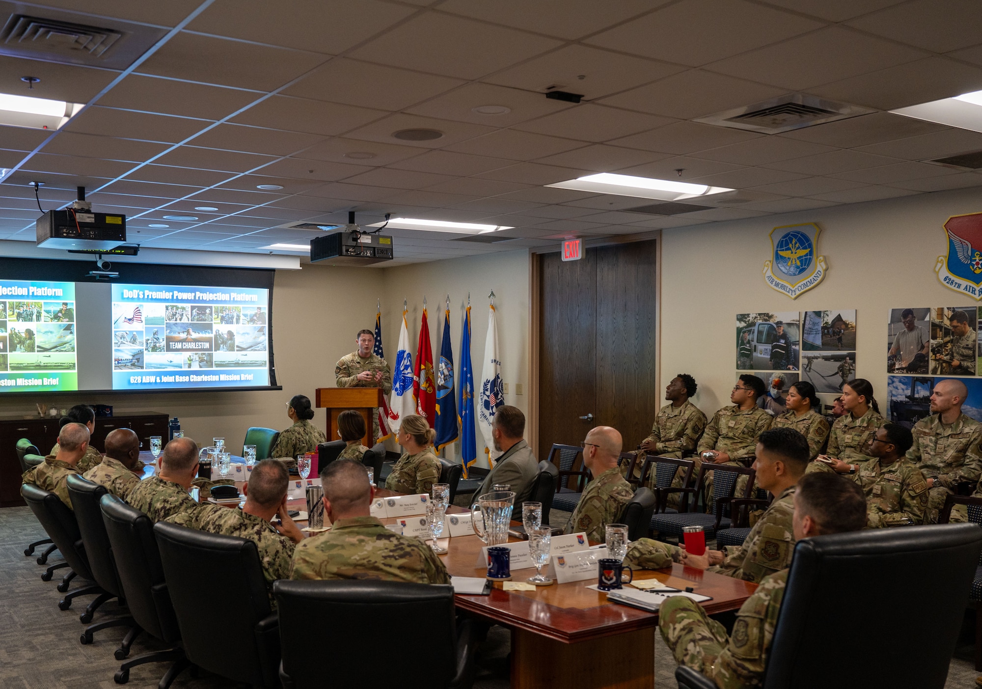 U.S. Air Force Senior Airman Blake Hinkson, 628th Comptroller Squadron financial analysis supervisor, briefs U.S. Air Force Brig. Gen. Stephen Snelson, U.S. Air Force Expeditionary Center commander, and Chief Master Sgt. Dennis Fuselier, USAFEC command chief, along with Joint Base Charleston leadership during their visit to JB Charleston, South Carolina, Oct. 29, 2024. During their visit, Snelson and Fuselier gained insight into JB Charleston’s vital contributions to global mobility, rapid deployment, and joint operations. (U.S. Air Force photo by Senior Airman Christian Silvera)